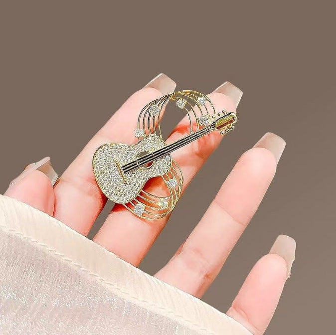 XSB178 - Golden Guitar Saree Brooch