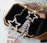 E962 - Star tassel long earrings