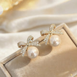 XE233 - Pearl Bowtie Stud Earrings