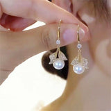 XE221 - Elegant Pearl Drop Angel Earrings