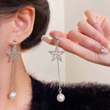 XE227 - Silver Star Drop Earrings
