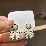E1501 - White Bowknot Earrings