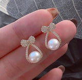 XE190 - Oval Pearl Earrings